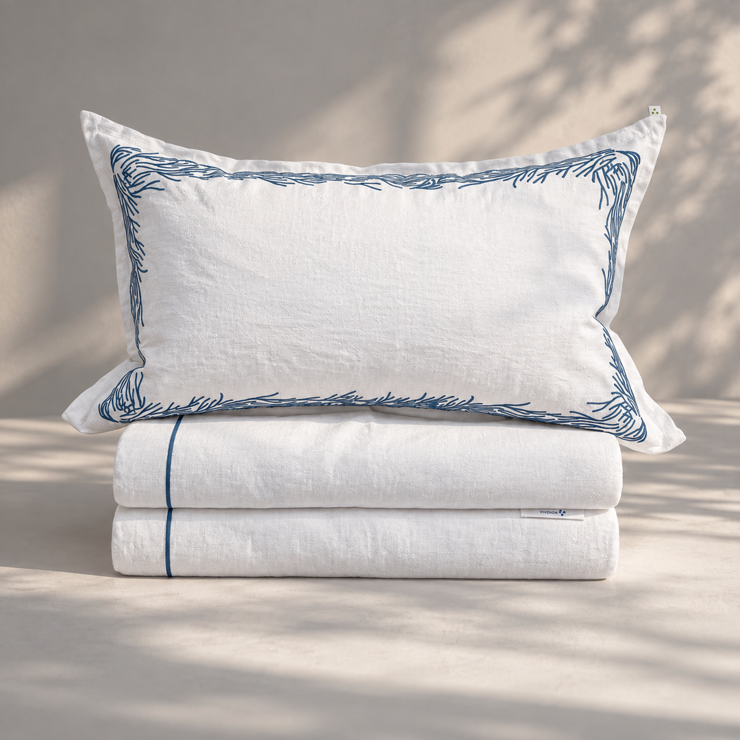 Juego de Funda Duvet Costa Vivenda de lino misto con fundas de almohada tipo sham a juego.